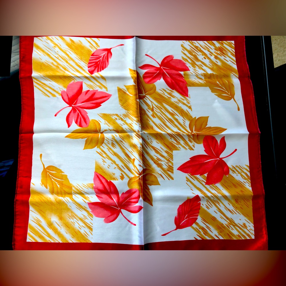 Brand new 100% silk scarf. Orange/ burgundy color mix.